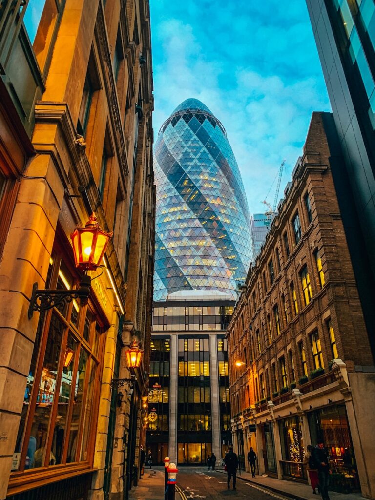 low-angle photography of a glass hotel building in the city during daytime